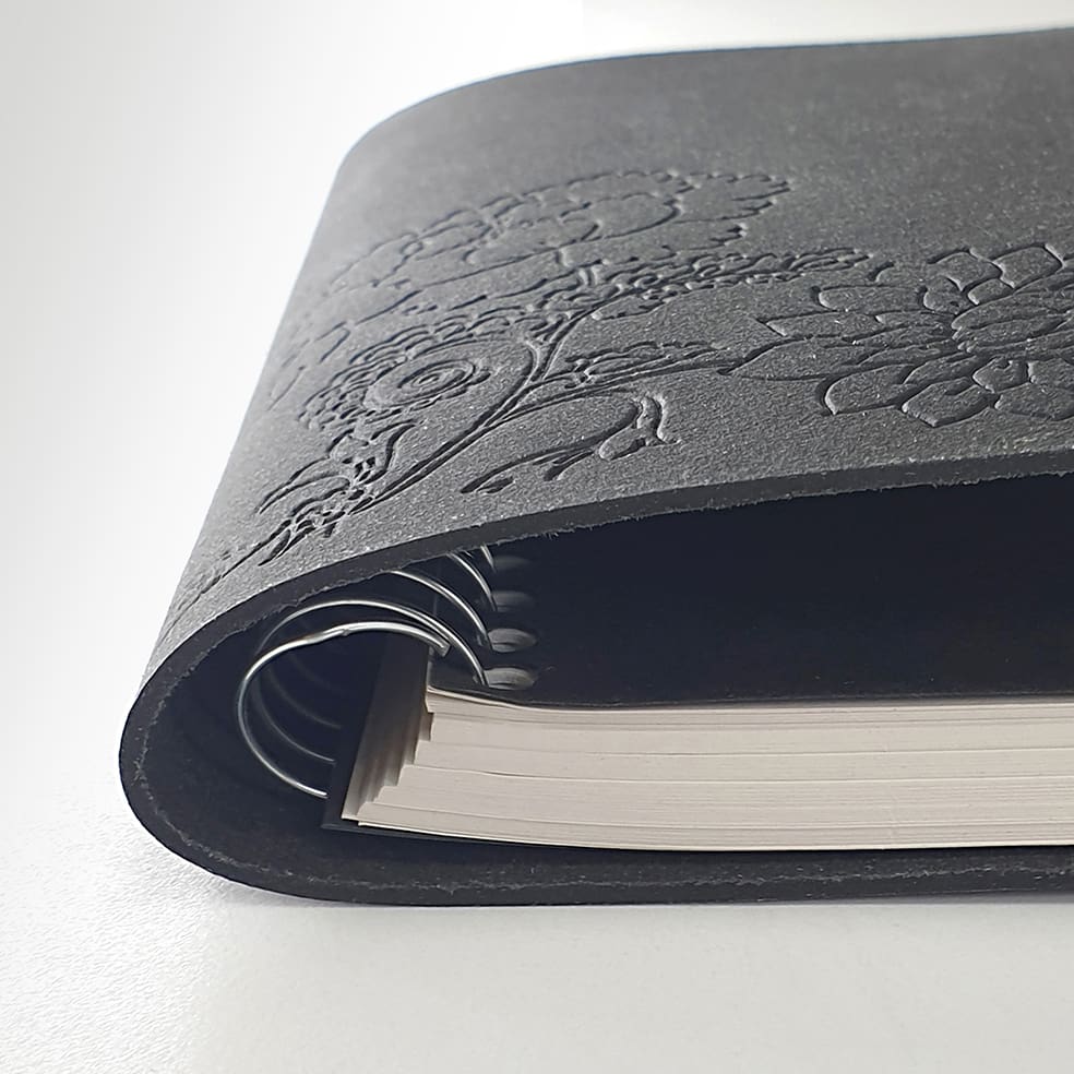 Arbos spiral notebook with recycled leather wrap-around cover
